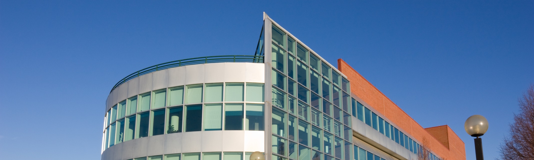 An energy efficient municipal building under a bright blue sky