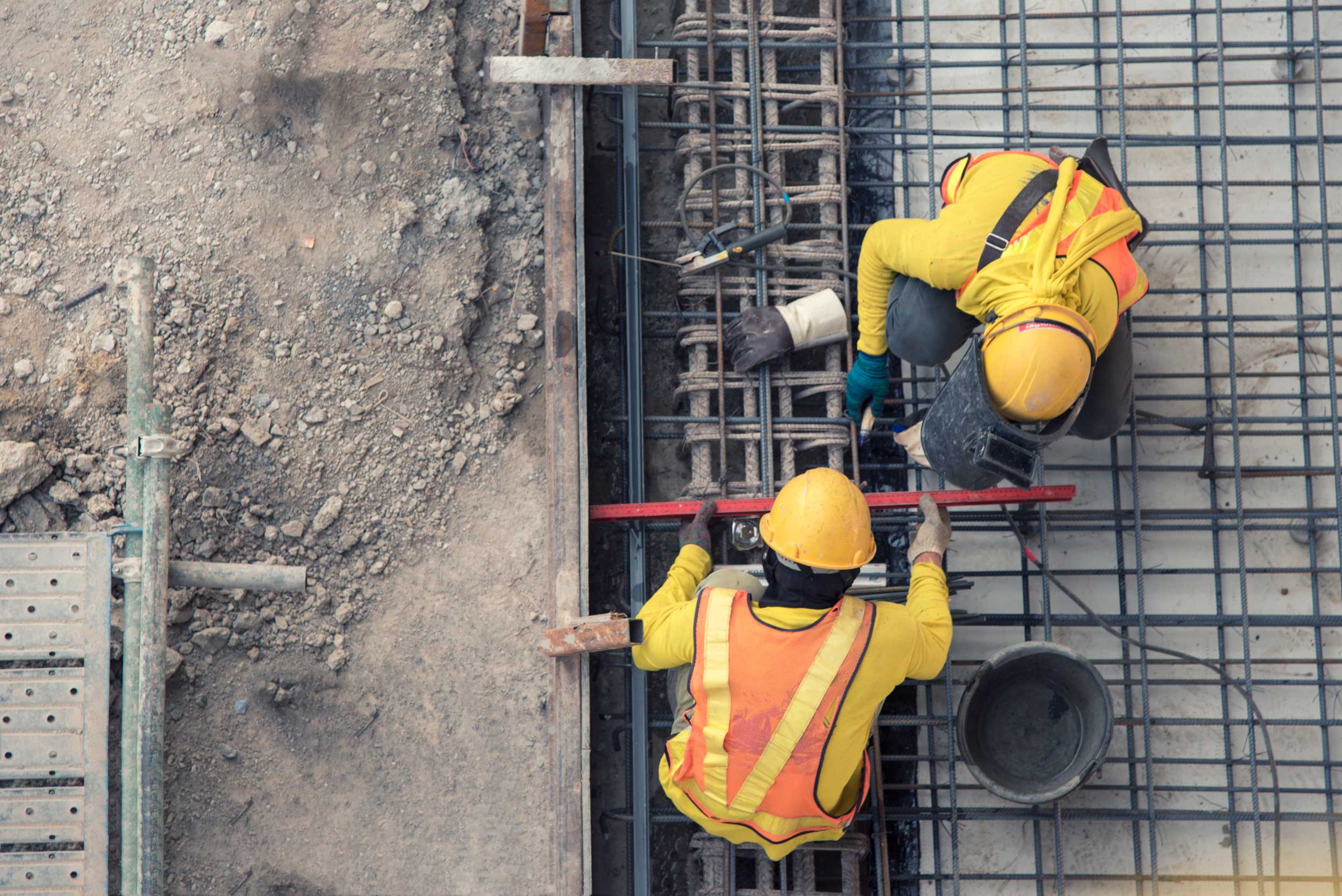 Aerial view of construction workers onsite.