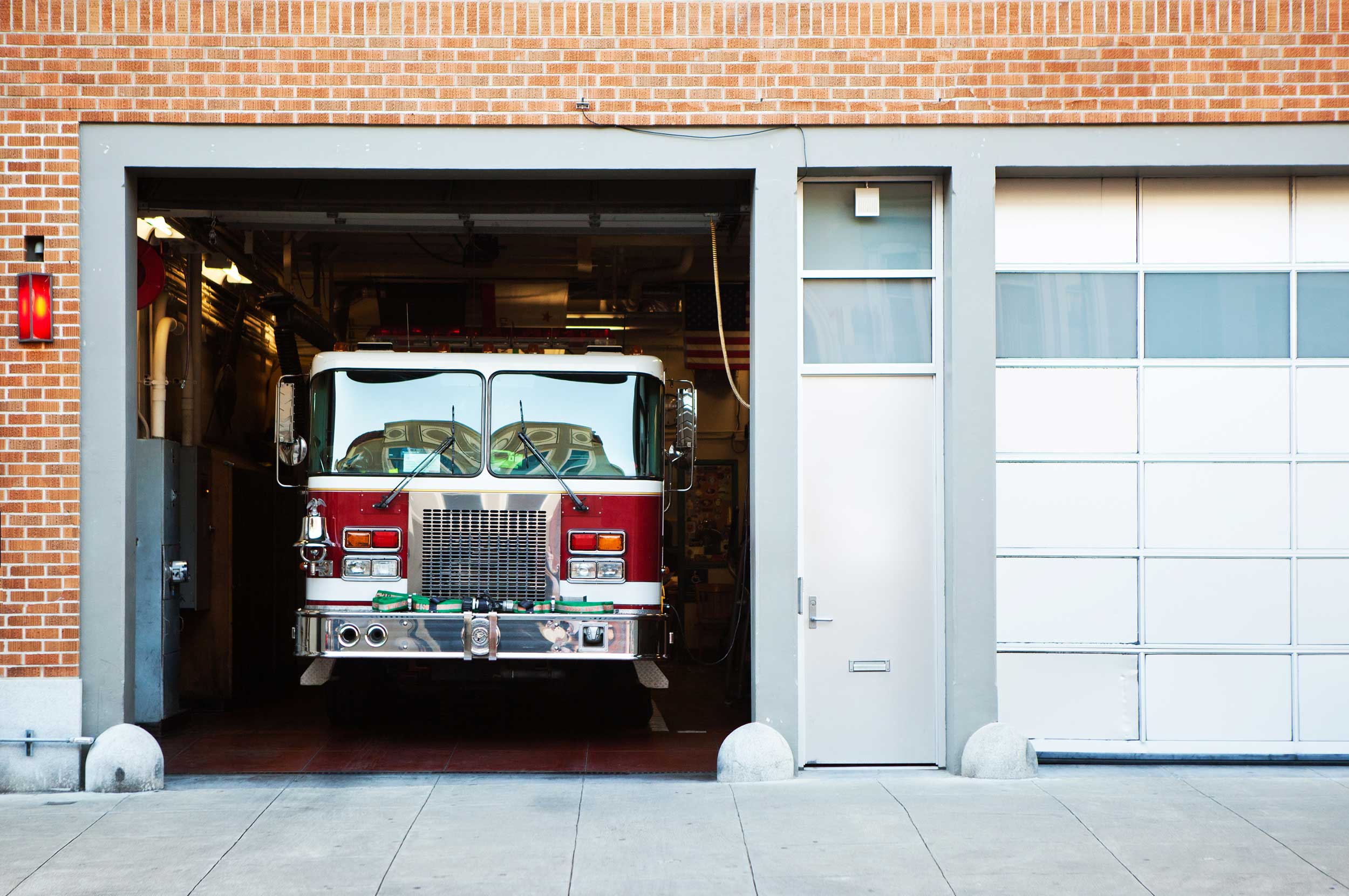 fire truck inside a fire station