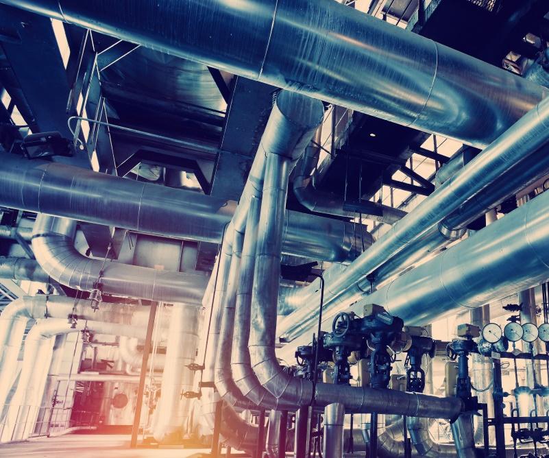 A complex web of shining heating pipes in a modern, efficient energy system