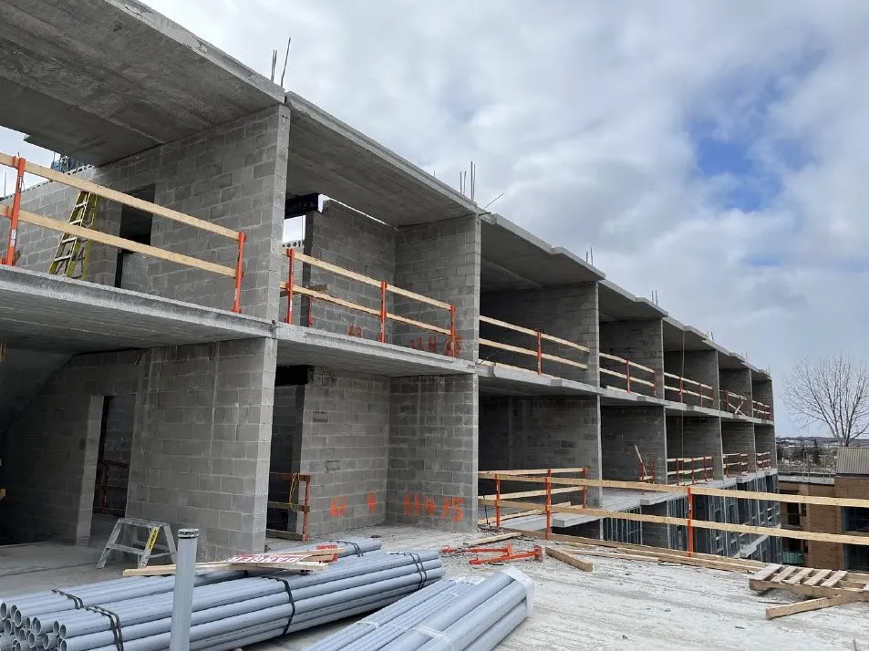 Construction underway at 420 Kingscourt Drive, with temporary railings in place for safety.