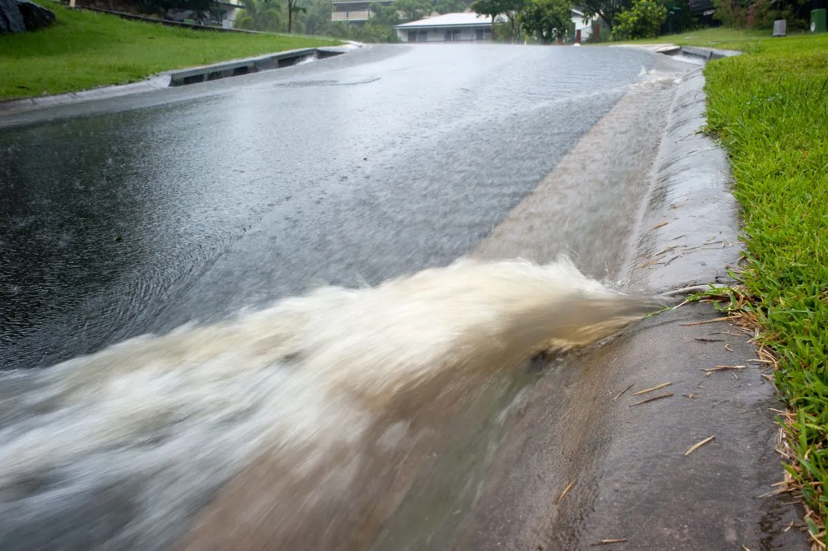 water flowing from stormwater drain