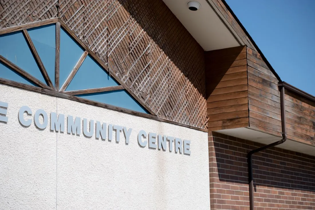 Close up of community centre building and sign.